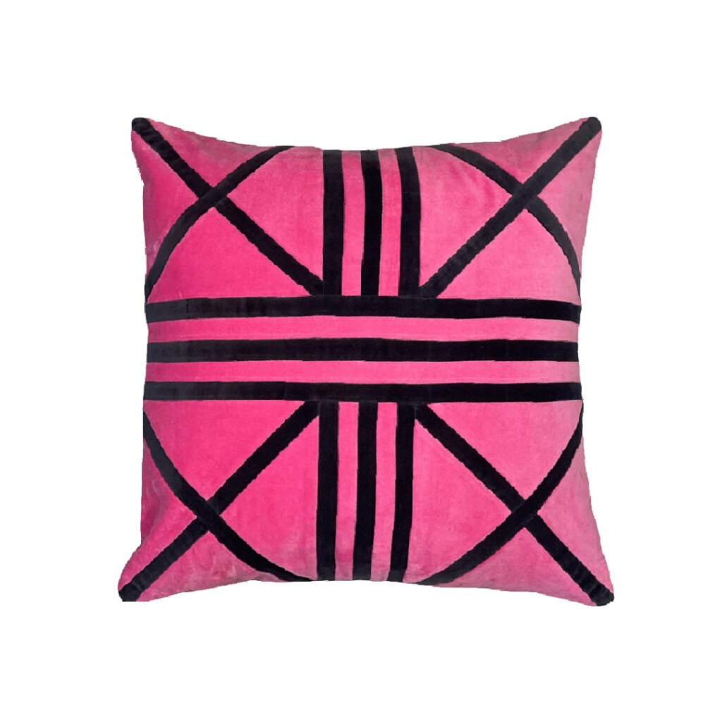 pink and black colored patchworked pillowcase